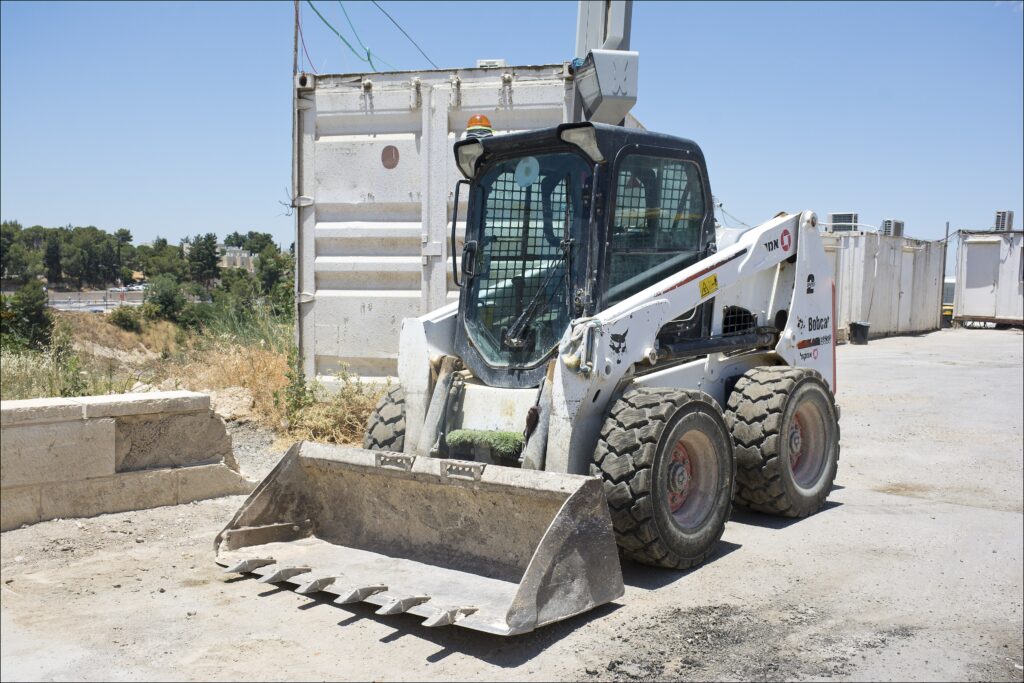 Bobcat S630 skid steer loader on a job site