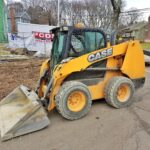 Case skid steer loader with smooth bucket
