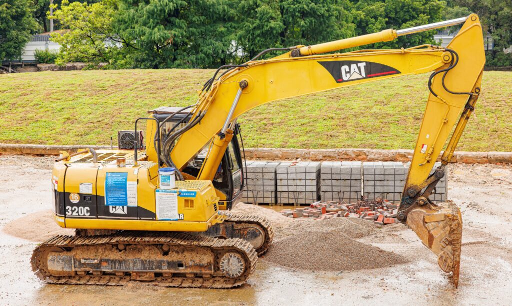 Caterpillar 320C hydraulic excavator on a city job site