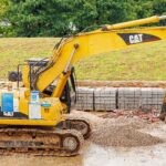 Caterpillar 320C hydraulic excavator on a city job site