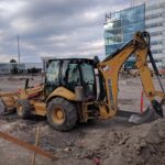 Caterpillar backhoe loader on a construction site