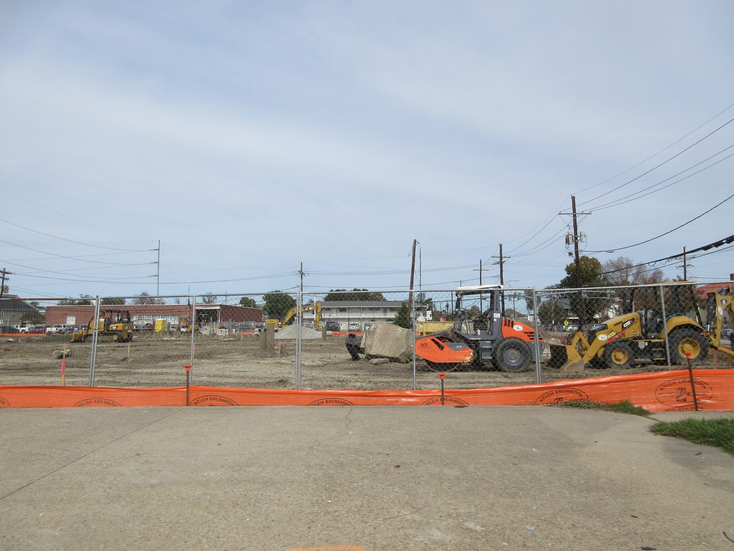 Wheel loader and excavator on a site preparation job