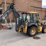 John Deere backhoe loader with extendahoe
